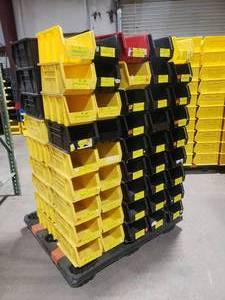 lot 401 image: Pallet of Uline S-12419 Yellow & Black Stackable Bins.  Each Bin Measures 15 x 8 x 7.  Also might be a few Akro Bins, Global or Quantum bins mixed in but they are all the same dimensions.
