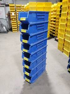 lot 383 image: Stack of 8 Quantum Storage Systems Stackable Bins QUS 950 Hulk Containers.  Each Bin Measures 23 78 x 8.25 x 7