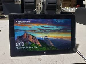 lot 523 image: Microsoft Surface Tablet w Padded Storage Bag