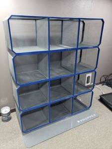 lot 591 image: Propper Metal 12 Compartment Shelf w Attached Base.  Shelf Measures 48 x 57 x 16