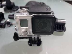 lot 596 image: GoPro Hero 3 Camera w Waterproof Case & Accessorries