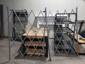 lot 644 image: Uline H-2827 6-8x6 2-Piece Folding Security Gate