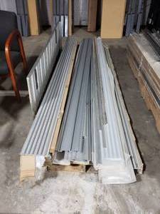 lot 656 image: Large Pallet Full of Aluminum Slat Wall Panels