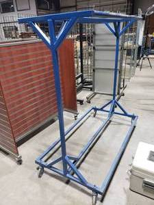 lot 671 image: Rolling Blue Double Clothes Rack