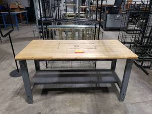 lot 674 image: Uline Wooden Top Adjustable Height Work Table.  Top Measures 60 x 30