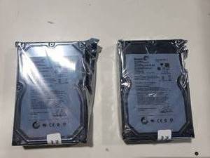 lot 734 image: Lot of 2 New Seagate 1TB Hard Drives