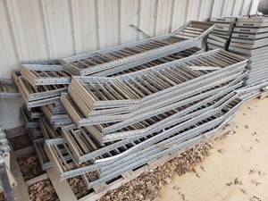 lot 790 image: Pallet of 32 Span Track Conveyor Flow Tracks.  Buyer Takes All