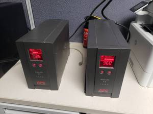 lot 800 image: Lot of 2 APC Back-UPS RS 1500 Battery Back Up & Universal Power Supplies