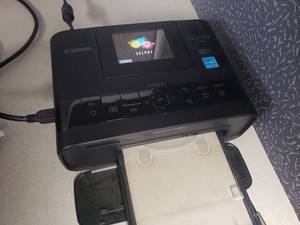 lot 806 image: Canon Selphy CP1200 Compact Photo Printer