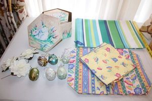 lot 34 image: Spring placemats and decorative Easter eggs plus Bunny nesting boxes.