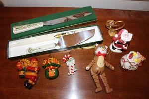 lot 33 image: Christmas serving set, Louis Rich and Lenox ornaments, wooden cat ornament, Santa salt and pepper set