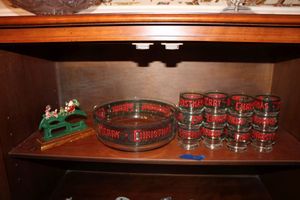 lot 30 image: Vintage Cera Houze Christmas punch or eggnog set plus cast iron nut cracker