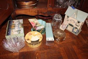 lot 53 image: Household dcor plastic shell bowls, wooden house, candle set, storage boxes