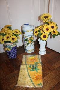 lot 65 image: Sunflower tablecloth, and vases with sunflowers