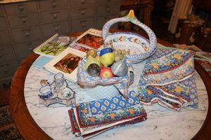lot 87 image: HB Henriot Quimper France dishes, Stone fruits and veggies (heavy), Tablecloth and napkin set, plus recipe books
