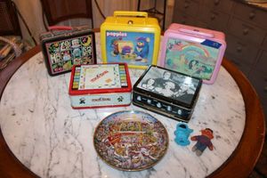 lot 89 image: Vintage Lunch boxes, toy cases and McDonalds collector plate