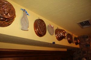 lot 91 image: Copper molds and Brown bag cookie molds, see photos