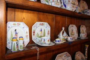 lot 95 image: HB Henriot Quimper France plates, salt and pepper shakers, bowl and bird dishes