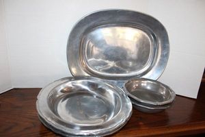 lot 104 image: Pewter platter and serving bowls