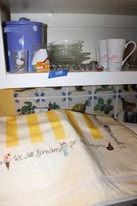 lot 148 image: Ice cream lot table cover, soda mugs, ice cream dishes, Enamel spoons and ceramic polka dot bucket
