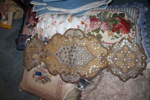 lot 416 image: Beaded table runner, decorative pillows and bedspread