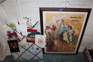 lot 422 image: Amy Steins Santa Fe Fiesta Cross of the Martyrs poster - autographed, see photos. Plus picture board