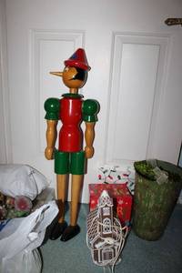 lot 425 image: Wooden Pinocchio doll, Christmas decorations and sugared fruit