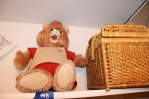 lot 448 image: Vintage talking Teddy Ruxpin bear and basket