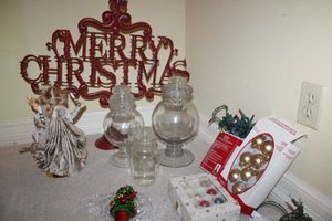 lot 278 image: Christmas lot 3 piece jar set, metal Merry Christmas sign, and decorations