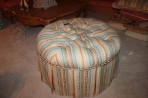 lot 316 image: Round upholstered ottoman