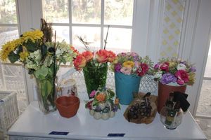 lot 187 image: Artificial flowers and vases