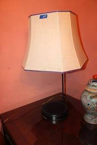 lot 205 image: Table lamp with large shade and wooden shelf base