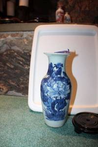 lot 217 image: Small Blue and white Imani Porcelain vase with wooden stand -