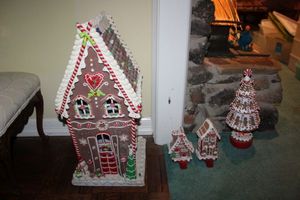 lot 225 image: Large Gingerbread house, gingerbread stocking holders, and candy tree