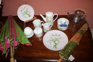 lot 228 image: Chinese tea set, bamboo and glass teapot, and umbrellas