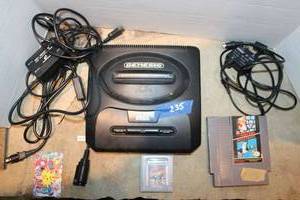 lot 235 image: Vintage gaming items Sega Genesis player, Nintendo Duck Hunt game, Raging Fighter game