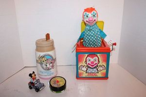 lot 264 image: Vintage toys - Jack in the Music Box, My Little Pony cup, Mickey Mouse car, McDonalds toy