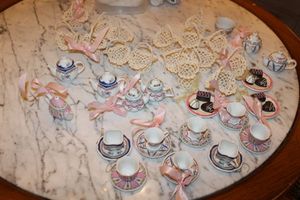 lot 227 image: Miniature tea set and basket place settings with plastic container