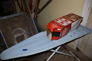 lot 551 image: Ironing board and 2 Gallon Sprayer