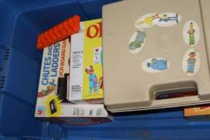 lot 545 image: Board games, Vintage Fisher Price record player, and tote
