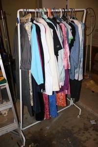 lot 578 image: Clothes rack with clothes