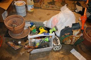 lot 591 image: Garden hose sprayers, terra cotta pots