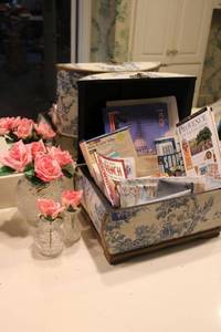 lot 479 image: Lead crystal bowlsvases with pink roses, Decorative box with travel books