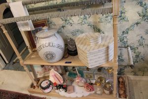lot 484 image: Bathroom decorations, Conch shell, bottles, and Mickey Mouse soap
