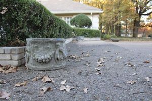lot 585 image: Pair of cement cherub planters (very heavy bring help)