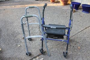 lot 556 image: Rolling walkers as shown