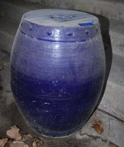 lot 612 image: Blue glazed stoneware stool