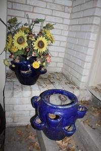 lot 616 image: Pair of blue glazed pocket jar planters