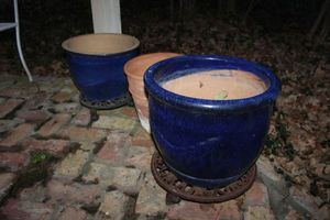 lot 640 image: Pair of blue glazed planters and one terra cotta planter