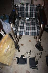 lot 558 image: NOVA wheelchair (with extra pad to make cushion) Looks new or barely used.